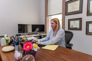 A BFS attorney working in her office